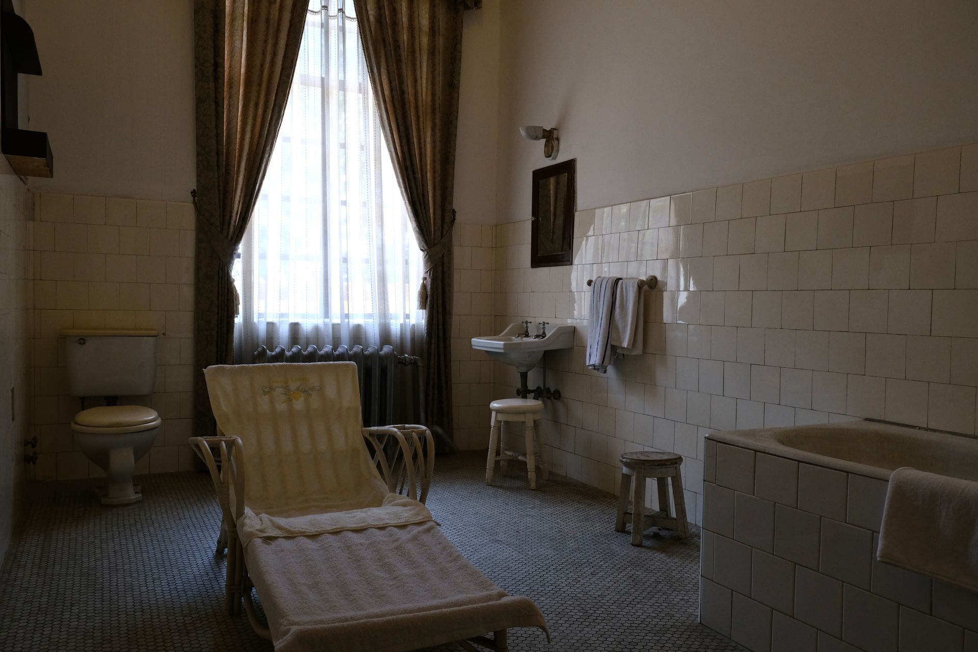Plumber's bathroom before renovation in Exampleton