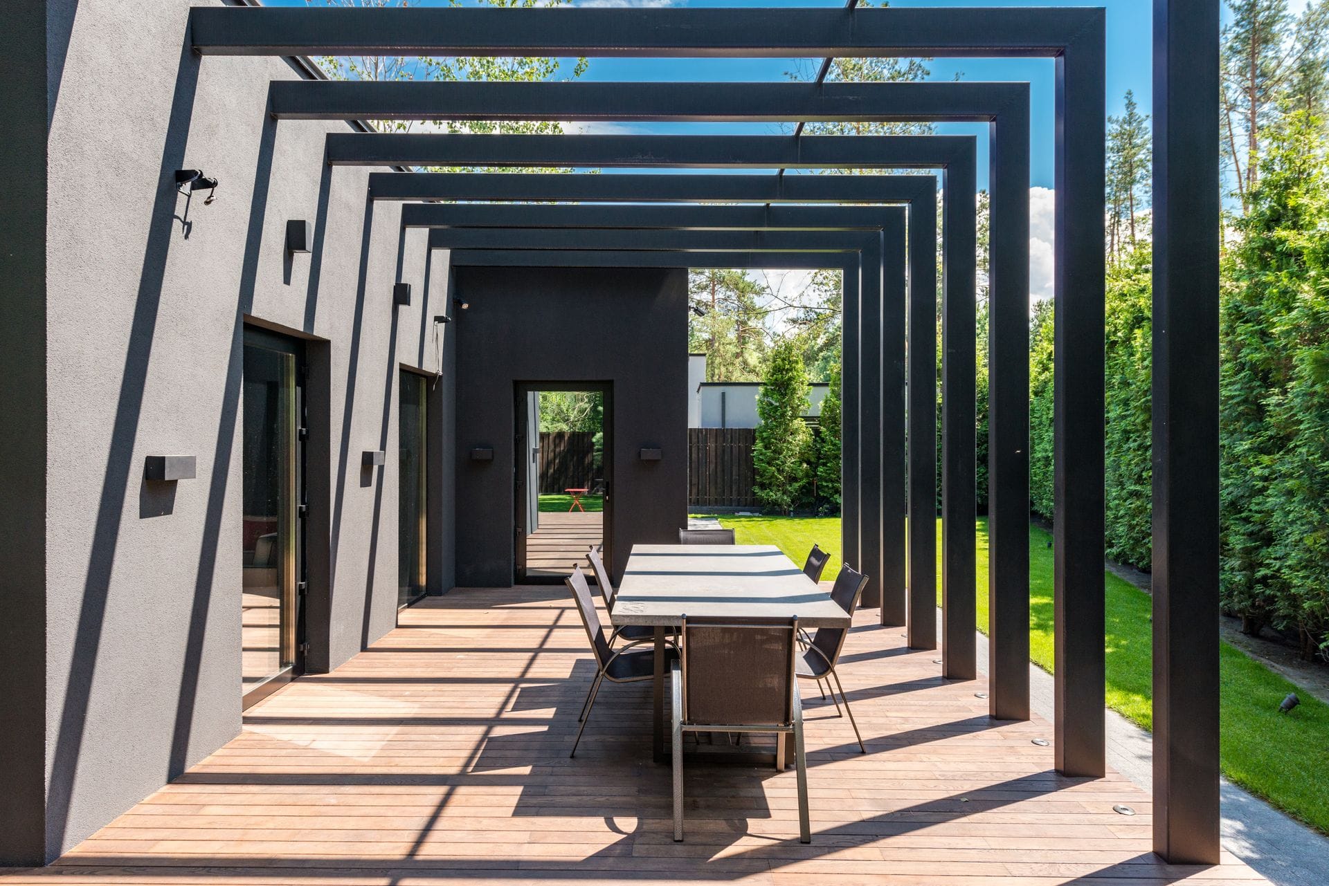 Hardwood garden decking and pergola built by a carpenter in Millbrook